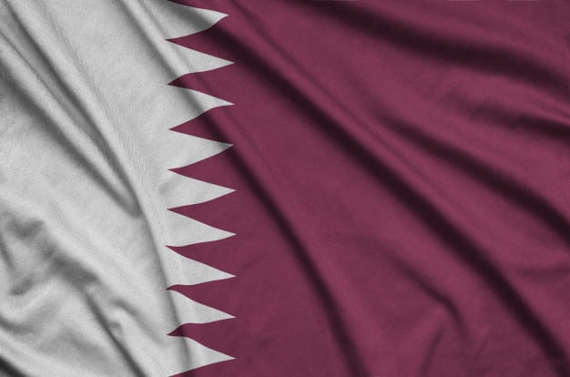 qatar flag is depicted sports cloth fabric with many folds 76080 7880