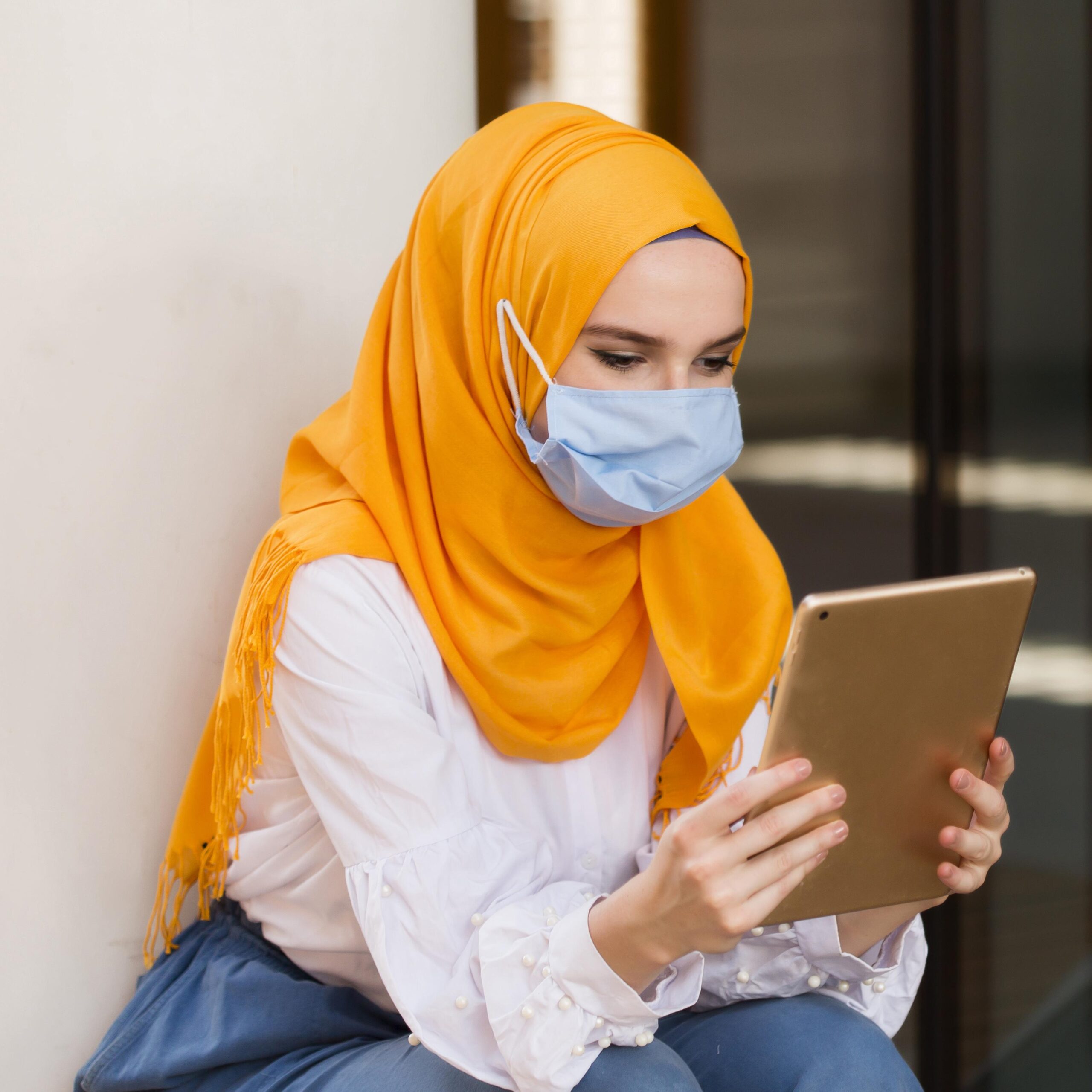 medium shot woman looking tablet scaled